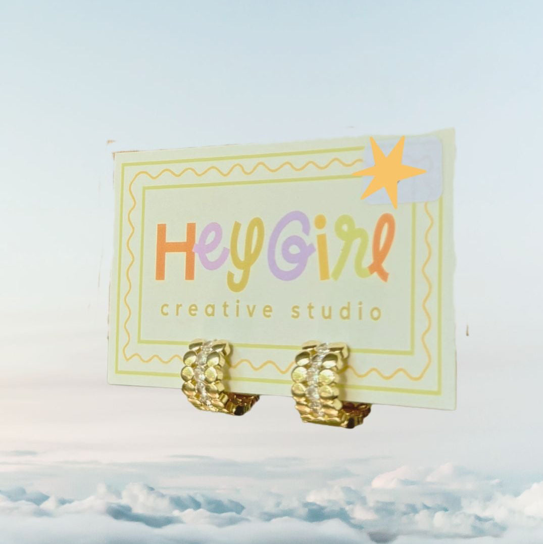 Gold huggies with rhinestone band